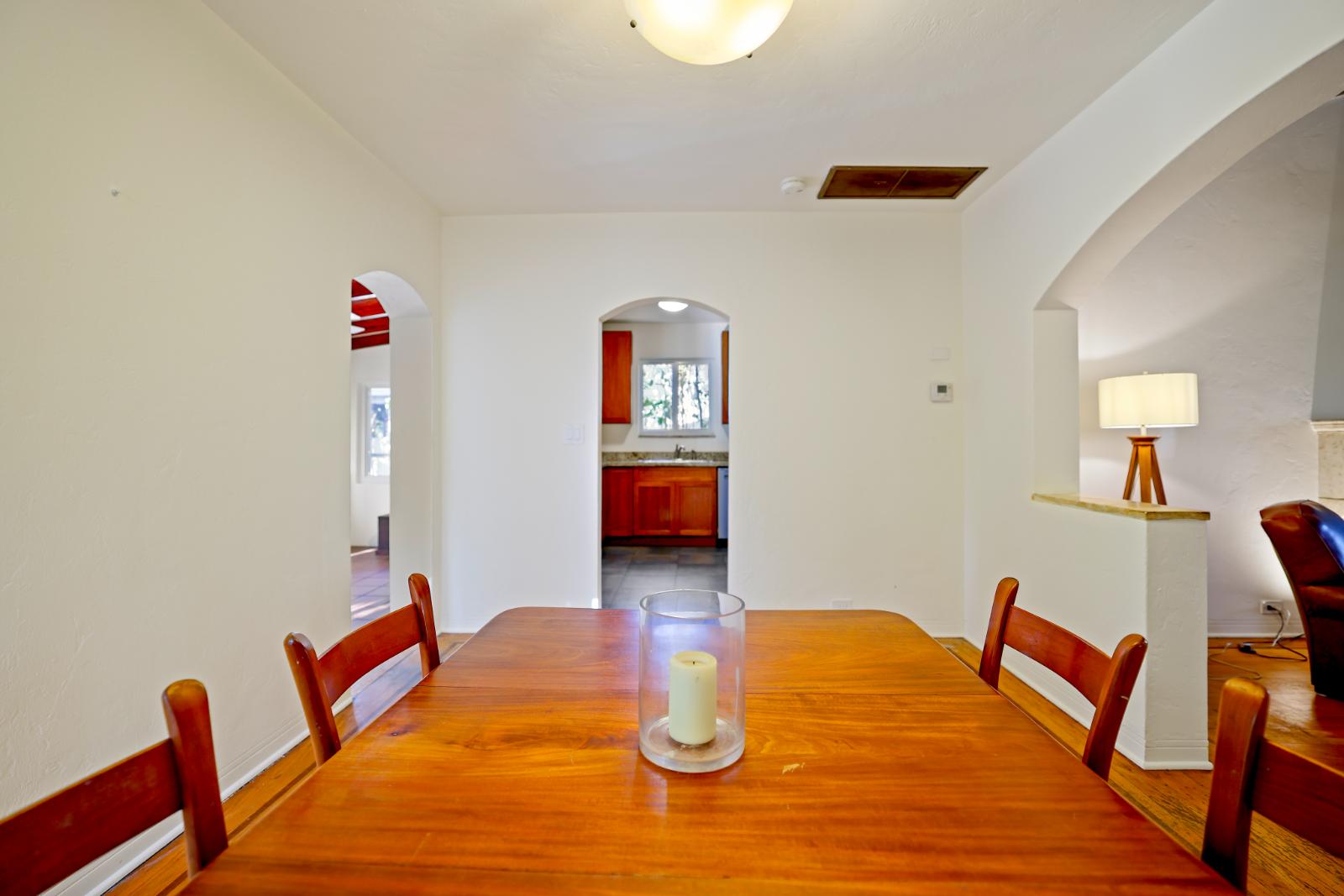 Dining area with hardwood floors and natural light